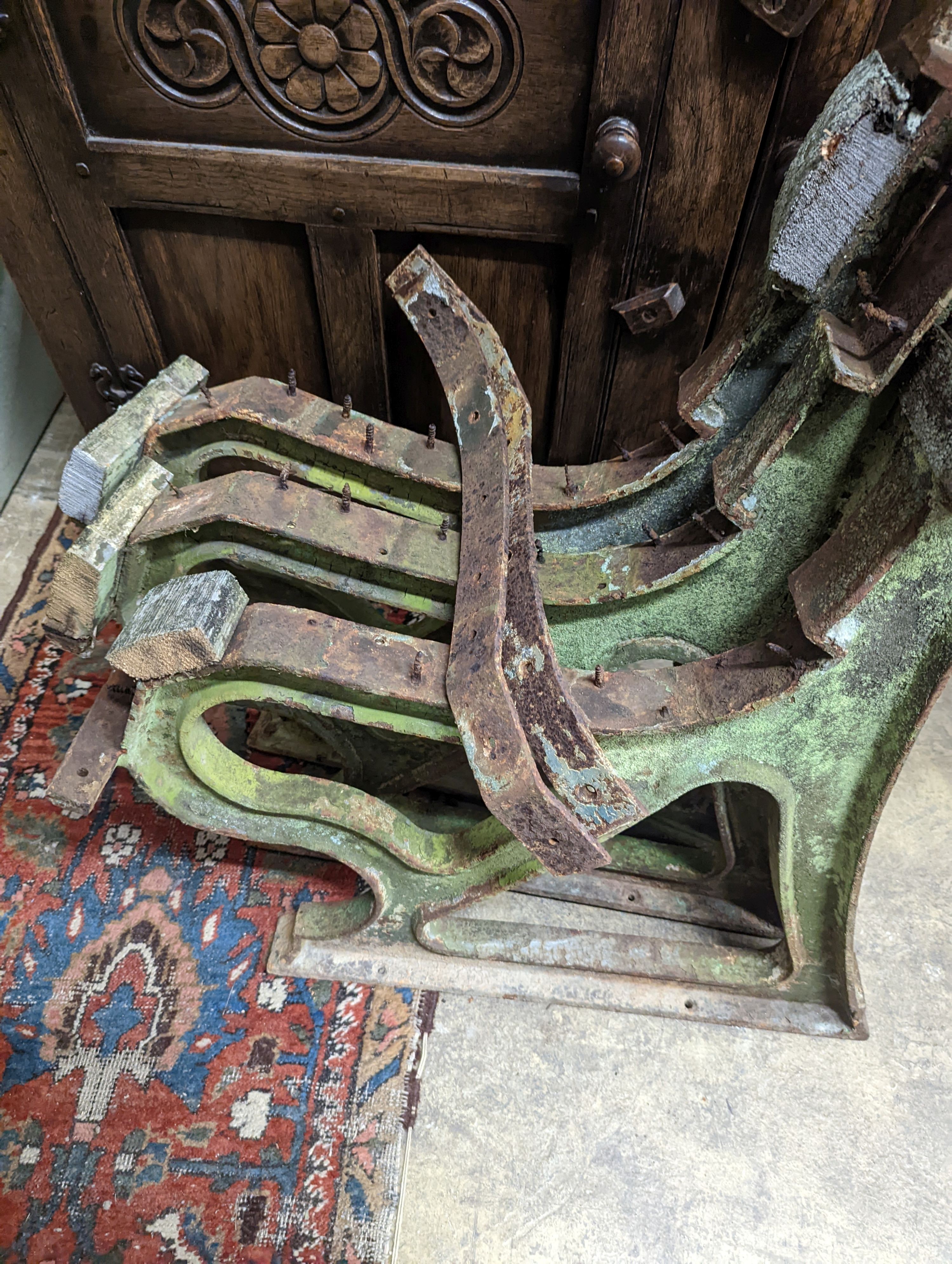 An early 20th century cast iron three section bench frame, probably marine or municipal, height 85cm